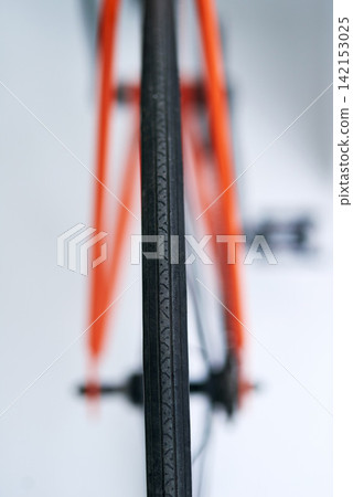 Sports, wheel and closeup of bicycle for cycling, fitness and exercise for race, health or challenge. Sustainable travel, eco friendly transport and bike for wellness, cardio workout and training Sports, wheel and closeup of bicycle for cycling, fitness and exercise for race, health or challenge. Sustainable travel, eco friendly transport and bike for wellness, cardio workout and training 142153025