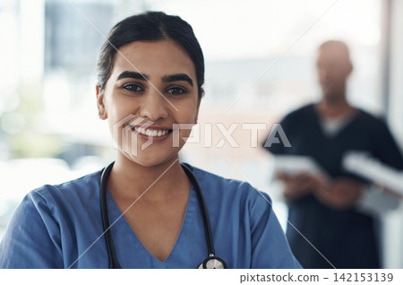 Portrait, nurse and happy woman in hospital for healthcare career, wellness and service in Brazil. Face, smile and young medical professional doctor, surgeon and expert employee working in clinic Portrait, nurse and happy woman in hospital for healthcare career, wellness and service in Brazil. Face, smile and young medical professional doctor, surgeon and expert employee working in clinic 142153139