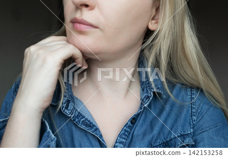 Close up of a woman showing venus rings and neck lines for skin aging, mesotherapy, and biorevitalisation treatments. Ideal for tech neck issues, cosmetology, and aesthetic dermatology. Close up of a woman showing venus rings and neck lines for skin aging, mesotherapy, and biorevitalisation treatments. Ideal for tech neck issues, cosmetology, and aesthetic dermatology. 142153258