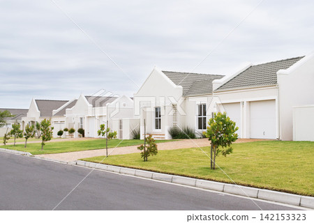 Street, house and houses in neighborhood, community or residential area in Dallas, Texas in USA. Background, property development or suburban homes for investment project or society in quiet town Street, house and houses in neighborhood, community or residential area in Dallas, Texas in USA. Background, property development or suburban homes for investment project or society in quiet town 142153323