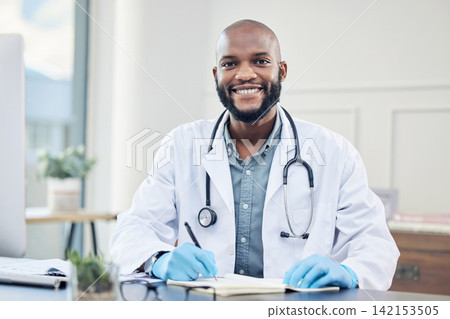Doctor, portrait and clinic with smile, writing and record for prescription in healthcare as professional. African male physician and hospital for consultation, medical and wellness with stethoscope Doctor, portrait and clinic with smile, writing and record for prescription in healthcare as professional. African male physician and hospital for consultation, medical and wellness with stethoscope 142153505