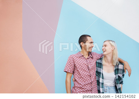 Couple, young and gen z, happy in studio and hug for bonding with laughter together and casual fashion on color block background. Mockup space, colorful wall and people in relationship with style Couple, young and gen z, happy in studio and hug for bonding with laughter together and casual fashion on color block background. Mockup space, colorful wall and people in relationship with style 142154102