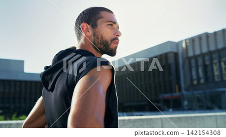 Man, urban and workout with relax or runner with pause, exercise and fitness for wellness. Male athlete, city and stop for rest with sport, training or running with breathe for health in outdoor 142154308