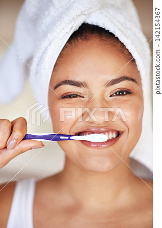 Happy, hygiene and portrait of woman with toothbrush for morning dental health routine in bathroom. Smile, wellness and female person with oral care product for plaque, gums and fresh breath at home. Happy, hygiene and portrait of woman with toothbrush for morning dental health routine in bathroom. Smile, wellness and female person with oral care product for plaque, gums and fresh breath at home. 142154367