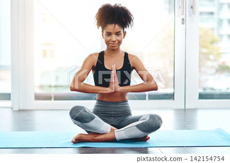 Portrait, yoga and home with woman, meditation and exercise with wellness, sunshine and fitness. Face, person and girl with peace, training and breathing with progress, zen and chakra with body care 142154754