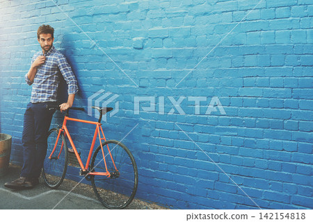 Travel, thinking and businessman with bicycle in city for job, opportunity or morning commute on wall background. Carbon neutral, journey and cycling pause in London with eco friendly transportation Travel, thinking and businessman with bicycle in city for job, opportunity or morning commute on wall background. Carbon neutral, journey and cycling pause in London with eco friendly transportation 142154818