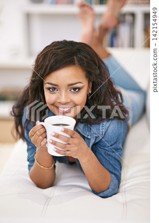 Portrait, woman or coffee to relax, weekend or happy in peace, satisfaction or sofa of new apartment. Female student, gen z girl or smile on living room, couch or accommodation to chill on break 142154949