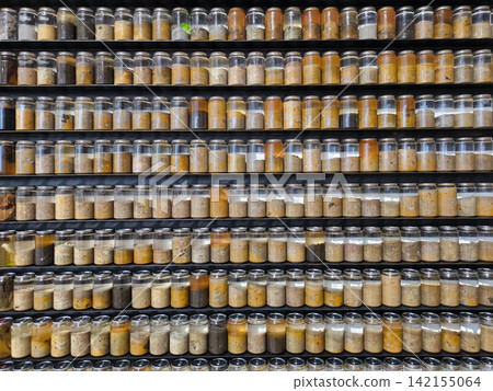 Rows of Glass Jars Containing Soil Samples Rows of Glass Jars Containing Soil Samples 142155064