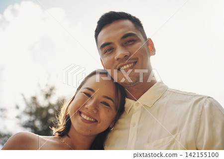 Couple, portrait and embrace with love at sunset with support, care and trust in marriage or vacation. Man, woman and relax in calm moment outdoor together with loyalty on adventure in summer mockup Couple, portrait and embrace with love at sunset with support, care and trust in marriage or vacation. Man, woman and relax in calm moment outdoor together with loyalty on adventure in summer mockup 142155100