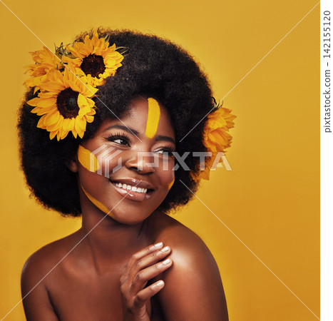 Black person, beauty and sunflower with skincare in studio for natural glow, cosmetics or soft skin. Woman, plant and confident with smile for organic, dermatology and vitamin e on yellow background Black person, beauty and sunflower with skincare in studio for natural glow, cosmetics or soft skin. Woman, plant and confident with smile for organic, dermatology and vitamin e on yellow background 142155120