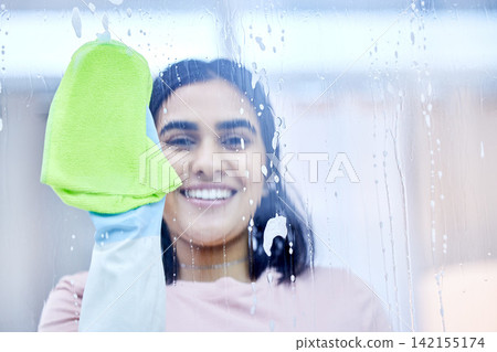 Woman, smile and cleaning glass in portrait with rag, disinfectant and window cleaner. Fluid, soap and cloth for spray in home with antibacterial for bacteria with pride for happiness with protect Woman, smile and cleaning glass in portrait with rag, disinfectant and window cleaner. Fluid, soap and cloth for spray in home with antibacterial for bacteria with pride for happiness with protect 142155174