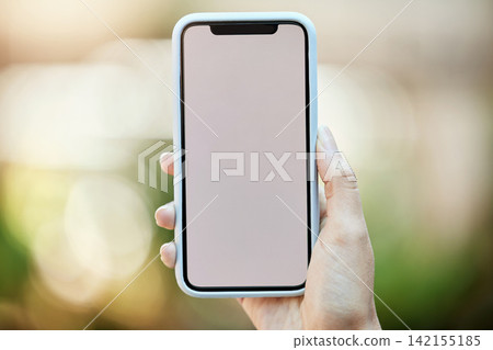 Hand, mockup on display and phone with person outdoor in garden for summer communication or network. App, contact and screen space on mobile for advertising, marketing or text message in green park 142155185