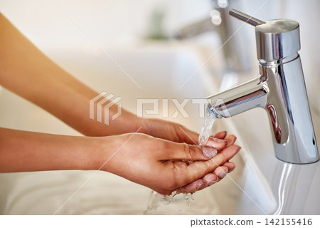 Tap, closeup or person washing hands in home or sink for wellness, dirty palm or healthy skincare hydration. Water, safety or cleaning with liquid for germs, virus or hygiene for bacteria prevention Tap, closeup or person washing hands in home or sink for wellness, dirty palm or healthy skincare hydration. Water, safety or cleaning with liquid for germs, virus or hygiene for bacteria prevention 142155416