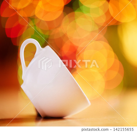 Bokeh, background and tea cup for warm drink, fine china or porcelain with crockery, catering and kitchenware. Color, light and ceramic drinkware with breakfast or break time beverage at cafe Bokeh, background and tea cup for warm drink, fine china or porcelain with crockery, catering and kitchenware. Color, light and ceramic drinkware with breakfast or break time beverage at cafe 142155655