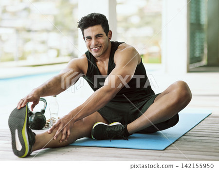 Stretching, legs and portrait of happy man in exercise and start with healthy preparation for workout. Training, flexibility or athlete warm up body with yoga or pilates for fitness challenge in home Stretching, legs and portrait of happy man in exercise and start with healthy preparation for workout. Training, flexibility or athlete warm up body with yoga or pilates for fitness challenge in home 142155950