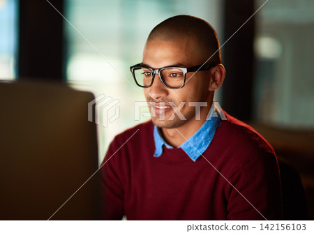 Night, reading and businessman with computer, glasses and planning for online editing project at agency. Research, internet and man writing article, review or copywriting report in dark office Night, reading and businessman with computer, glasses and planning for online editing project at agency. Research, internet and man writing article, review or copywriting report in dark office 142156103