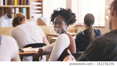 Teenager, girl and portrait in classroom for education lecture in high school or scholarship, notebook or students. Female person, face and desk for academic development or academy, smile or study 142156256