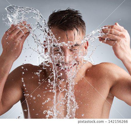 Water, studio and man in shower, smile and morning for washing of body, clean and routine for skincare. Hygiene, happy and person in grey background of bathroom, liquid and relax for bath for face Water, studio and man in shower, smile and morning for washing of body, clean and routine for skincare. Hygiene, happy and person in grey background of bathroom, liquid and relax for bath for face 142156266