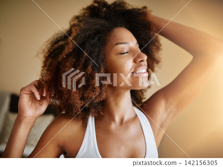 Home, peace and black woman stretching, smile and happiness with weekend break, sunshine and stress relief. Bedroom, apartment and African person with wellness, holiday and calm with healthy routine Home, peace and black woman stretching, smile and happiness with weekend break, sunshine and stress relief. Bedroom, apartment and African person with wellness, holiday and calm with healthy routine 142156305