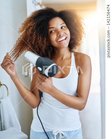 Girl, happy and hair dryer for hairstyle in bathroom, heat treatment and electric appliance. Female person, cosmetics and home for beauty or curly volume, grooming and confidence in dermatology Girl, happy and hair dryer for hairstyle in bathroom, heat treatment and electric appliance. Female person, cosmetics and home for beauty or curly volume, grooming and confidence in dermatology 142156474