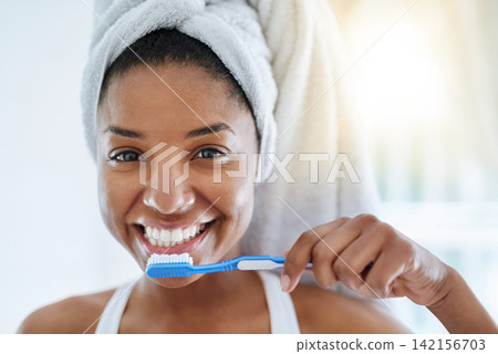 Black girl, portrait and toothbrush for oral health in bathroom, morning and dental cleaning. Happy female person, healthcare and hygiene treatment in home, brushing and orthodontics for cosmetics 142156703