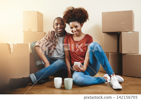 Black couple, real estate and portrait on floor of new house with bonding, support and break from moving day. People, homeowner or excited for property investment, dream home or relocation with boxes Black couple, real estate and portrait on floor of new house with bonding, support and break from moving day. People, homeowner or excited for property investment, dream home or relocation with boxes 142156705