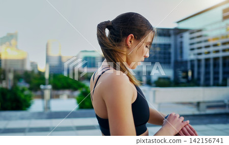 Fitness, woman and check watch in city for workout goals, cardio progress or running. Sports health, athlete and female person for monitor performance, training app or track speed in urban town Fitness, woman and check watch in city for workout goals, cardio progress or running. Sports health, athlete and female person for monitor performance, training app or track speed in urban town 142156741