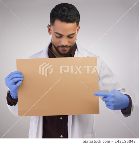 Sign, man and doctor pointing at poster for healthcare, advertising or mockup isolated on white studio background. Scientist, banner or medical professional on board to show blank space for marketing 142156842