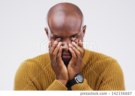 Portrait, black man and frustrated in studio with eye roll for stress, frustration and burnout. African male person, annoyed and hands on face for tension, anxiety and crazy mood by white background Portrait, black man and frustrated in studio with eye roll for stress, frustration and burnout. African male person, annoyed and hands on face for tension, anxiety and crazy mood by white background 142156887