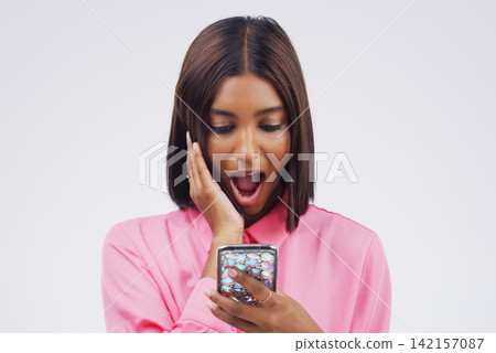 Woman, emoji and cellphone in studio for surprise, wow and contact and social media for networking. Gen z, female student and influencer with shock for technology, meme and reading secret online Woman, emoji and cellphone in studio for surprise, wow and contact and social media for networking. Gen z, female student and influencer with shock for technology, meme and reading secret online 142157087