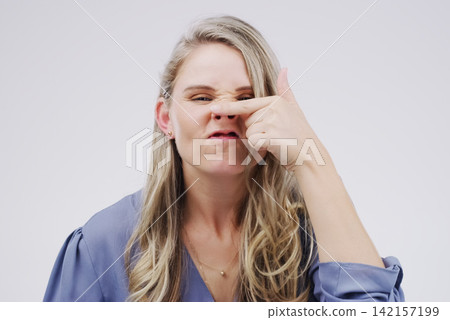 Woman, portrait and pig nose in studio for funny face, humor or joke or comedy on white background. Female person, childish and casual fashion with hand gesture for teasing, comic and geeky or quirky Woman, portrait and pig nose in studio for funny face, humor or joke or comedy on white background. Female person, childish and casual fashion with hand gesture for teasing, comic and geeky or quirky 142157199