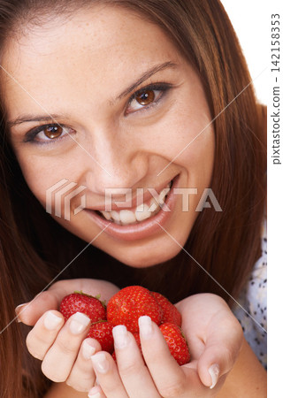 Portrait, woman and smile with strawberry fruits for detox, vegan diet and fresh ingredients for nutrition. Face of happy girl holding red berries, healthy food and sustainable benefits of vitamin c Portrait, woman and smile with strawberry fruits for detox, vegan diet and fresh ingredients for nutrition. Face of happy girl holding red berries, healthy food and sustainable benefits of vitamin c 142158353