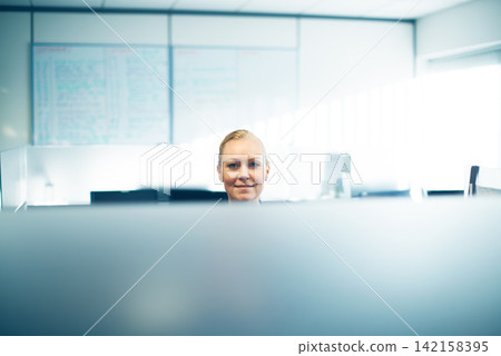 Working, cubicle and portrait of business woman in office for planning, human resources and job. Corporate, professional and person in workplace for insurance company, consulting agency and startup Working, cubicle and portrait of business woman in office for planning, human resources and job. Corporate, professional and person in workplace for insurance company, consulting agency and startup 142158395