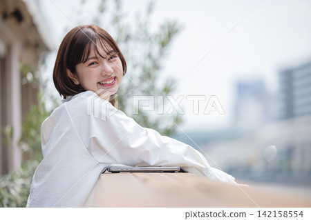 woman showing a smile woman showing a smile 142158554