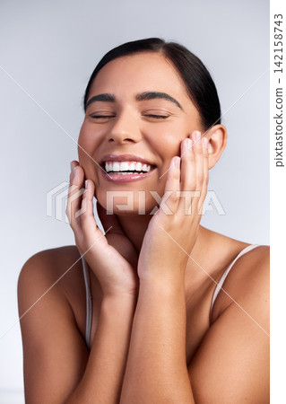 Happy, beauty and woman with self care of skincare, dermatology and mockup in studio background. Confidence, model and girl with glow on skin from cosmetics, facial or healthy texture on face 142158743