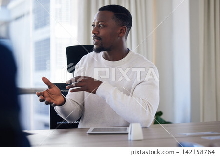 Black man, workshop and meeting in office with tablet, business review and update for project management. Employee, talking and connection in workplace with tech, idea discussion and report feedback 142158764