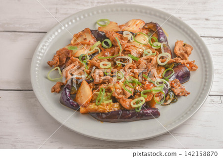 Stir-fried eggplant, kimchi, and pork Stir-fried eggplant, kimchi, and pork 142158870