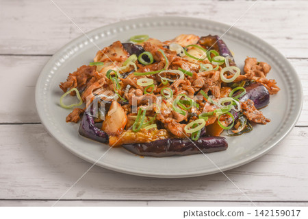 Stir-fried eggplant, kimchi, and pork Stir-fried eggplant, kimchi, and pork 142159017