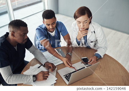 Doctor, teamwork and thinking on laptop for meeting, research ideas and medical results with new software. Healthcare group, people and nurse with online presentation or computer for clinic decision Doctor, teamwork and thinking on laptop for meeting, research ideas and medical results with new software. Healthcare group, people and nurse with online presentation or computer for clinic decision 142159046