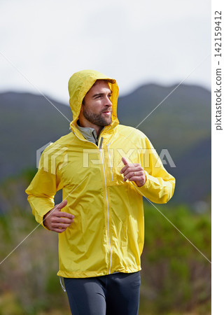 Running, rain and man with exercise, training and endurance with progress and dedication with nature. Wet, runner and athlete with cardio and wellness with wind and breathing with fitness and workout Running, rain and man with exercise, training and endurance with progress and dedication with nature. Wet, runner and athlete with cardio and wellness with wind and breathing with fitness and workout 142159412