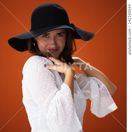 Woman, studio and hat with portrait for fashion with trendy, cool and summer outfit for vacation style inspiration. Designer, brown background and trends with glamour for clothing with pride Woman, studio and hat with portrait for fashion with trendy, cool and summer outfit for vacation style inspiration. Designer, brown background and trends with glamour for clothing with pride 142160044
