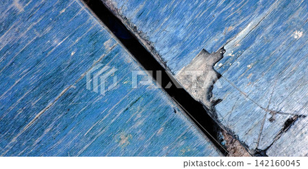 Weathered blue painted wooden planks Weathered blue painted wooden planks 142160045