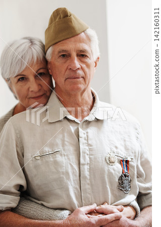 Military, old man and woman with veteran in uniform with medal or pride for memory of battle service. Elderly couple, army or retirement from duty to government with support, care or hug from partner Military, old man and woman with veteran in uniform with medal or pride for memory of battle service. Elderly couple, army or retirement from duty to government with support, care or hug from partner 142160311