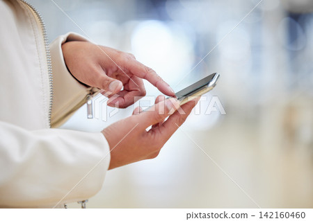 Hands, phone and woman in mall texting online to search for bargain notification, social media or internet. Retail, fashion and female person on mobile app for chat, shopping and website sale code Hands, phone and woman in mall texting online to search for bargain notification, social media or internet. Retail, fashion and female person on mobile app for chat, shopping and website sale code 142160460