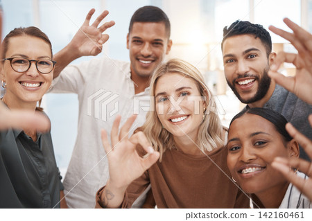 Selfie, smile and diversity at office with OK hand sign, trust agreement and support for success together. Gesture, emoji and people with professional group, feedback or review with vote or like Selfie, smile and diversity at office with OK hand sign, trust agreement and support for success together. Gesture, emoji and people with professional group, feedback or review with vote or like 142160461
