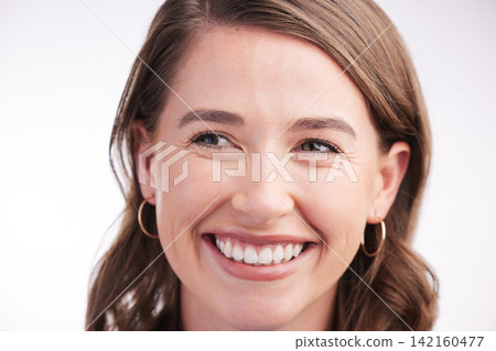 Happy woman, laughing or thinking in studio for skincare or beauty for natural shine, idea or face. Funny, smile or girl with healthy glow or dermatology cosmetics for wellness on grey background Happy woman, laughing or thinking in studio for skincare or beauty for natural shine, idea or face. Funny, smile or girl with healthy glow or dermatology cosmetics for wellness on grey background 142160477