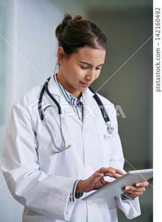 Healthcare, doctor and woman with tablet for telehealth, research or online consultation in hospital. Smile, stethoscope and health worker with technology for support, wellness and medical care Healthcare, doctor and woman with tablet for telehealth, research or online consultation in hospital. Smile, stethoscope and health worker with technology for support, wellness and medical care 142160492