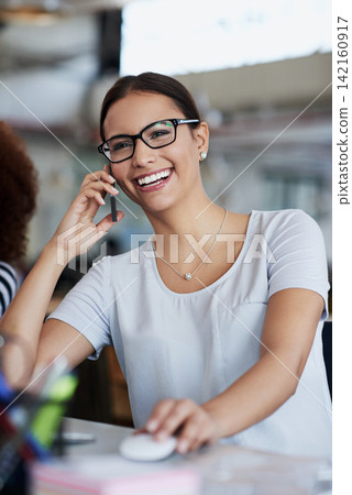 Office, phone call and woman with smile at desk for networking, communication and planning. Contact, discussion and journalist with smartphone at work for article review, feedback and good advice Office, phone call and woman with smile at desk for networking, communication and planning. Contact, discussion and journalist with smartphone at work for article review, feedback and good advice 142160917