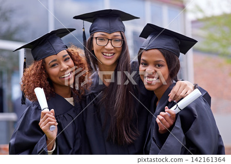 Portrait, university and girl students at graduation excited for future with pride, happiness and confidence. Smile, education and women friends with college degree, diploma or certificate on campus. Portrait, university and girl students at graduation excited for future with pride, happiness and confidence. Smile, education and women friends with college degree, diploma or certificate on campus. 142161364
