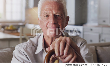 Senior man, portrait and walking stick in house sitting on sofa for retirement, relax and comfort. Elderly person, happy and cane in home for peace, calm and pension while thinking about memories Senior man, portrait and walking stick in house sitting on sofa for retirement, relax and comfort. Elderly person, happy and cane in home for peace, calm and pension while thinking about memories 142161477